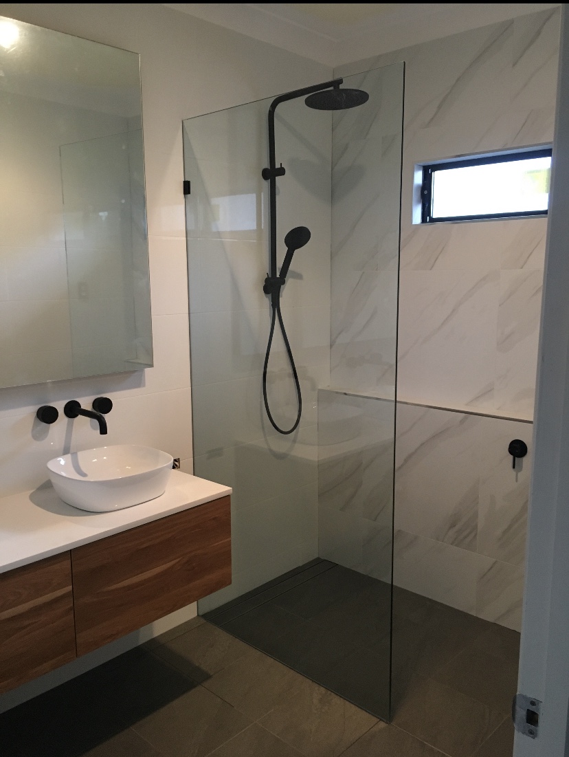 bathroom renovation waterfall shower floating vanity